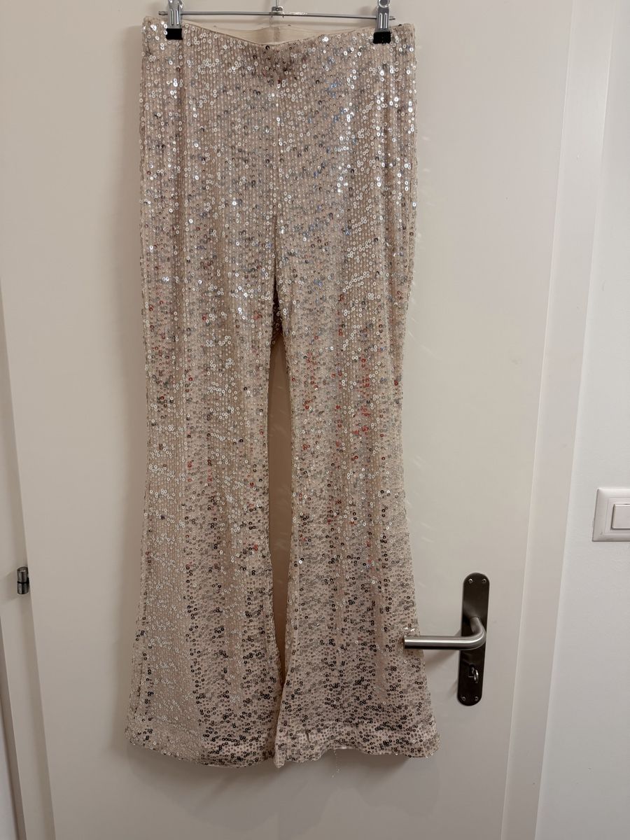 H&M Pantaloni: H&M Flare Pants Sequins Beige Size M – Usato da Zürich venduto da Dory84