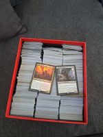 Box filled with Magic the Gathering Cards