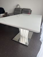 Modern White Extendable Dining Table - Perfect for Spring