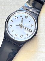 Swatch Uhr schwarz mit Datum und Wochentag 