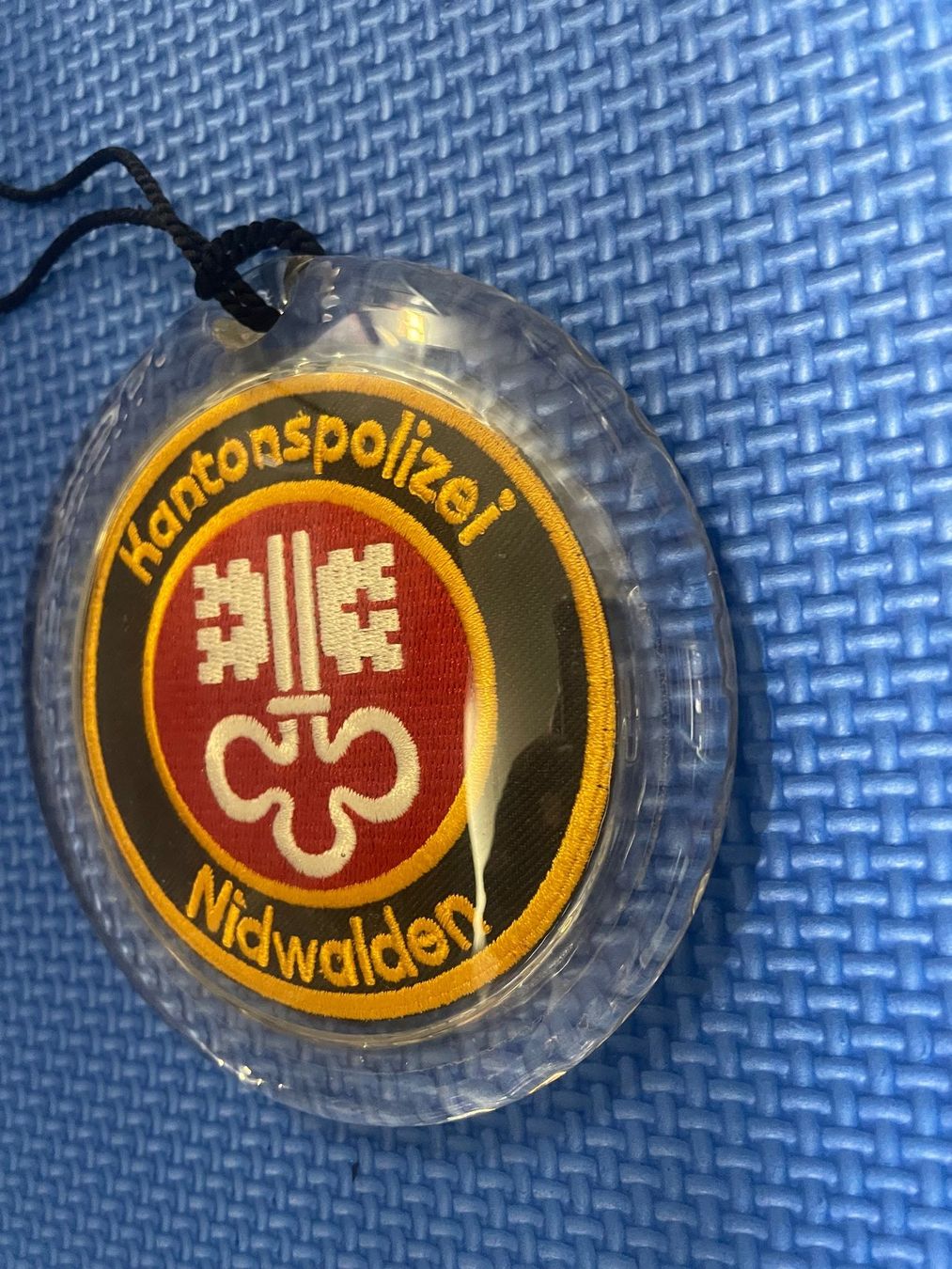 Placchette & Badge: Kantonspolizei Nidwalden Glasplakette, unbenutzt – Nuovo e nell'imballaggio originale da Willerzell venduto da Eluchs 1