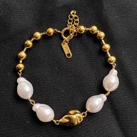 18KGP Goldene Perlen Armkette