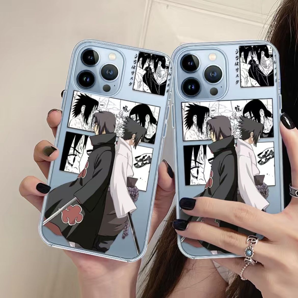 Apple Cover & Protezioni schermo: Sasuke / Itachi iPhone 14 Pro Schutzhülle - NEU! – Nuovo e nell'imballaggio originale da Emmenbrücke venduto da Umbrella.Corporation 1