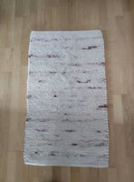 Deux tapis tour de lit