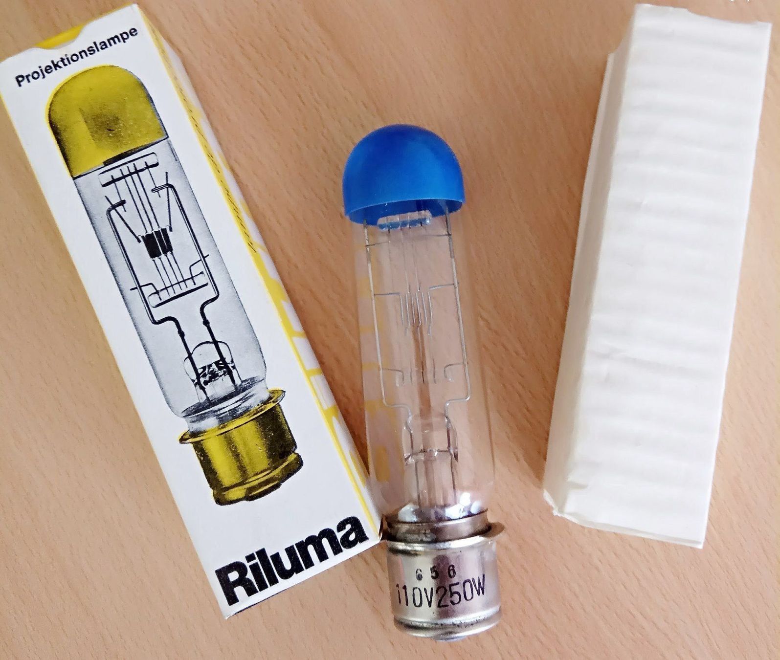 Lampade: Projektorlampe Riluma – Nuovo e nell'imballaggio originale da Reinach AG venduto da Amroch