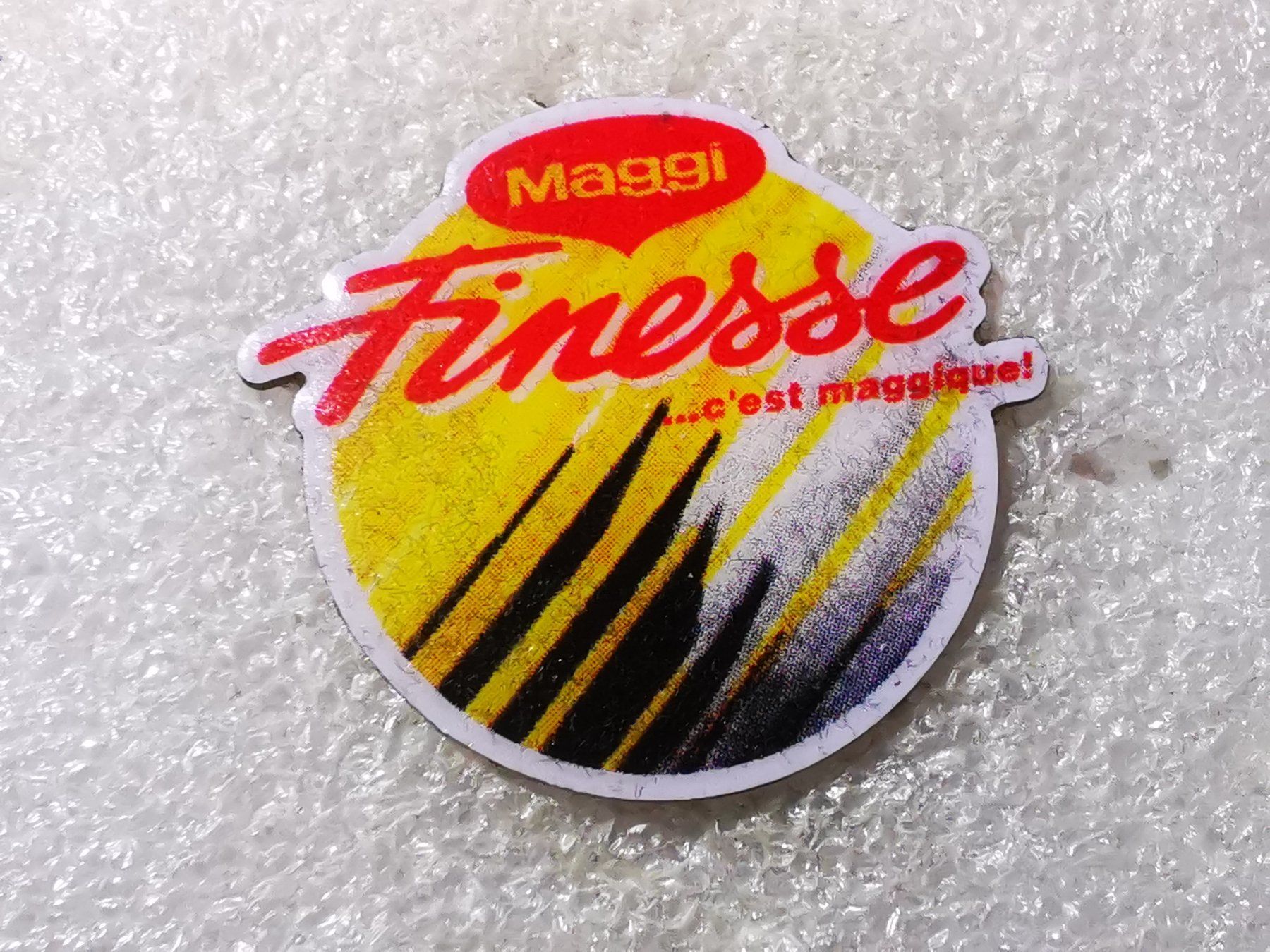 Plaketten & Abzeichen: Ansteckpin 111: Maggi – Gebraucht aus Oppligen von Pin-Fall-Shop