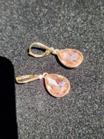 Boucles d'oreilles pendantes DKNY avec cristaux roses
