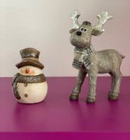 Rentier und Schneemann