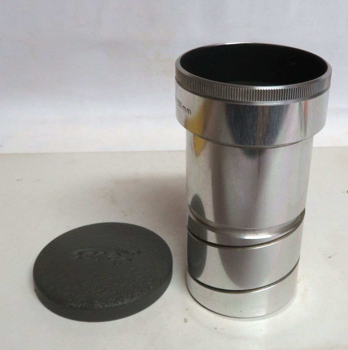 Leitz Obiettivi: Leitz Objektiv Dimaron 1:2.8 / 100mm – Usato da Tüscherz-Alfermée venduto da Newpad 7