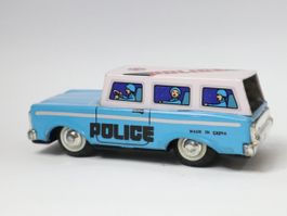 Blechauto Polizei Kombi Police Schwungradantrieb