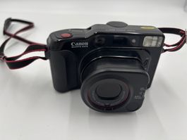 Ancien appareil photo Canon Top Twin avec pochette
