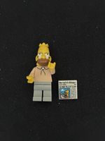 Personaggio Lego Simpsons con giornale, come da foto