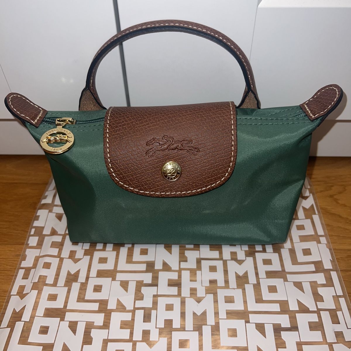 Longchamp Borse: Longchamp Pochette mit Henkel le Pliage Original – Nuovo (secondo la descrizione) da Moosseedorf venduto da sof_rls6