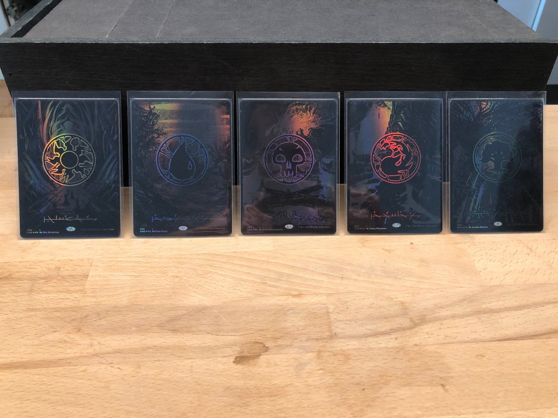 Magic The Gathering Carte collezionabili: MTG all Phyrexian oil slick raised foil basic lands NM – Nuovo (secondo la descrizione) da Corsier GE venduto da SWmoderncards