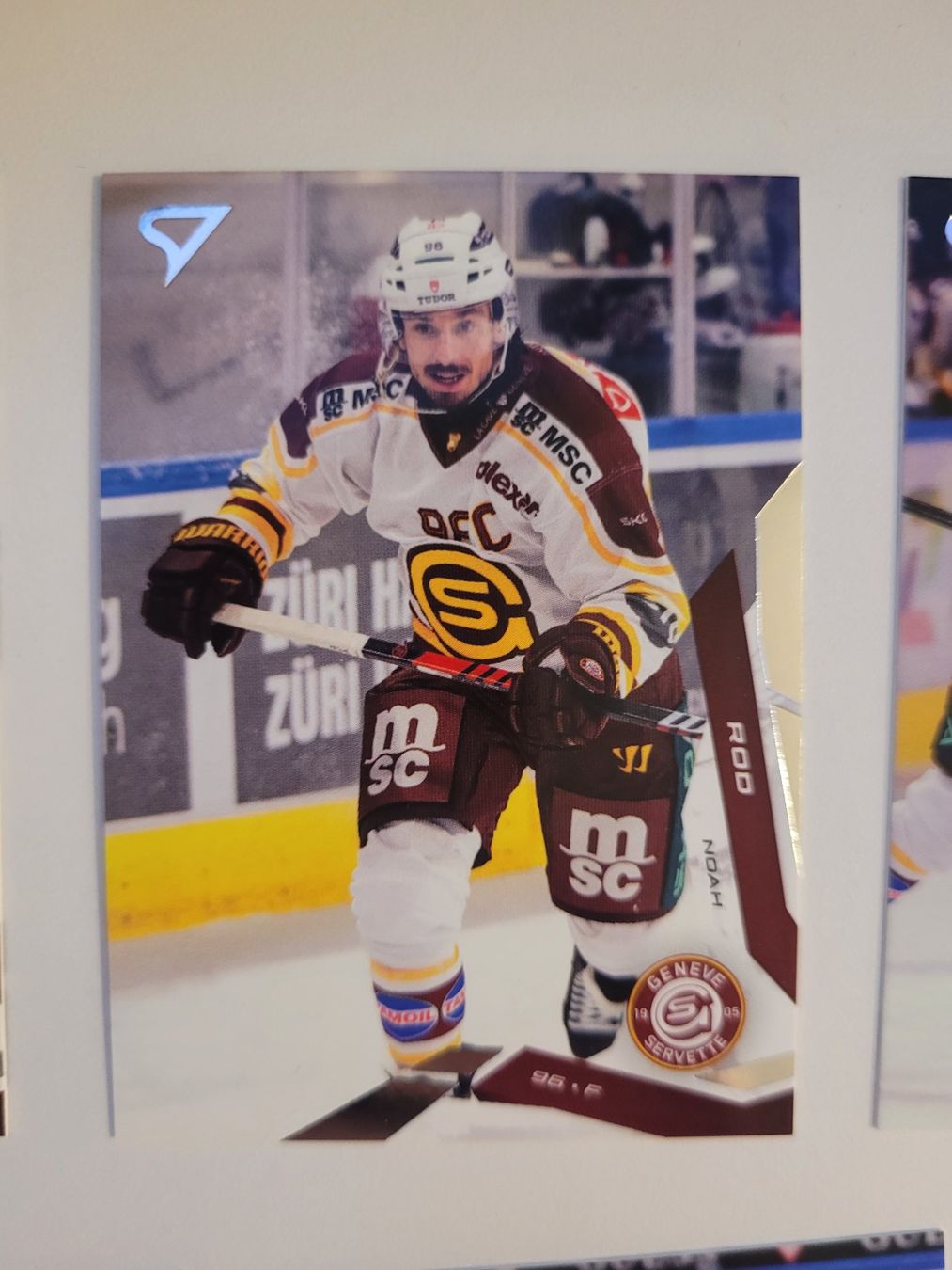 Sportzoo Carte collezionabili: 2025/26 HC Genf-Servette Noah Rod Base – Usato da Bauma venduto da Yotanke