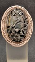 Silberring mit geschnitztem Blumenrelief