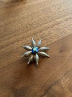 Sternblume mit Glitzerstein