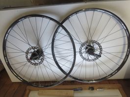 DT Swiss Laufradsatz 26" 28 Speichen H135mm V100mm