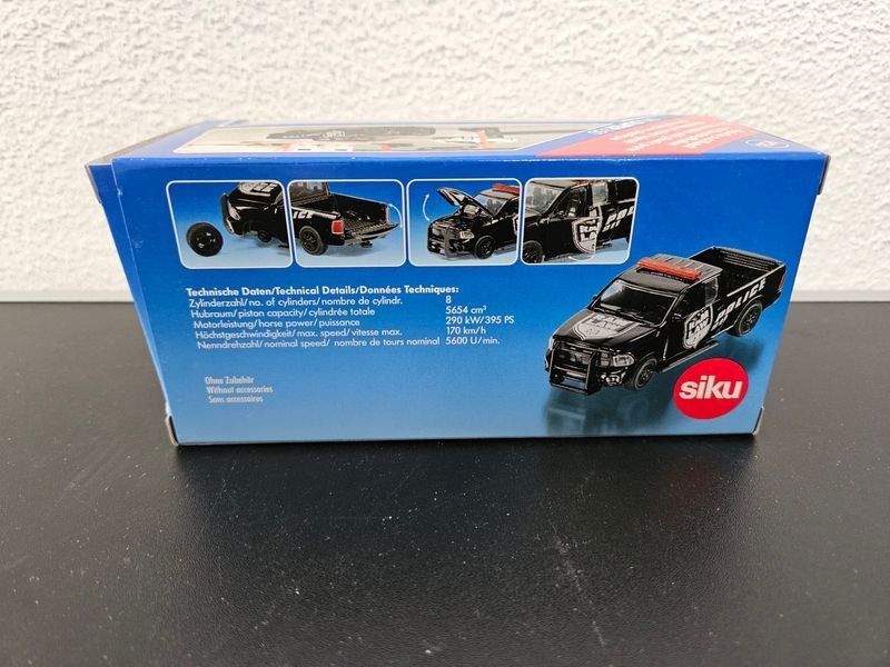 Siku Giocattoli: Neu - Siku - 2309 - RAM 1500 US-Polizei – Nuovo e nell'imballaggio originale da Dagmersellen venduto da Jarsetz_Restposten 1