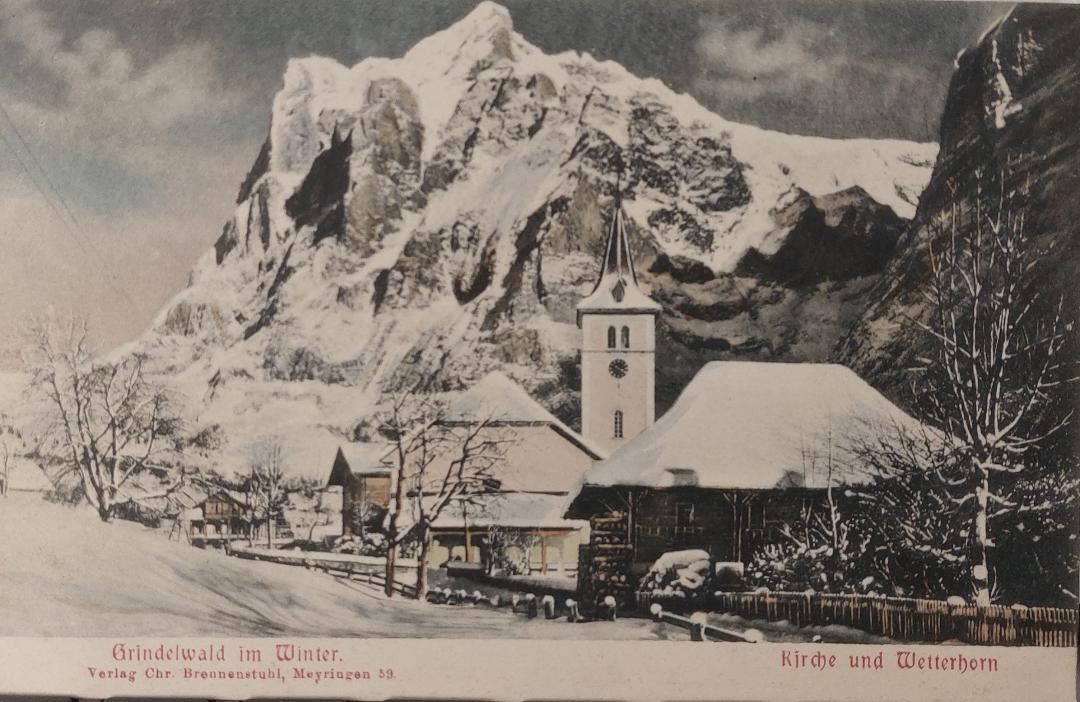 Cartoline postali: GRINDELWALD im Winter - Kirche & Wetterhorn – Usato da Delémont venduto da Domdom1