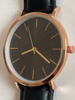 Armbanduhr roségoldfarben mit schwarzem Band gebraucht