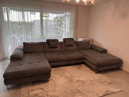 Grosses dunkelgraues Ecksofa