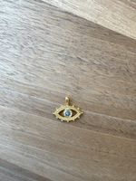 Anhänger Auge goldfarben mit Stein