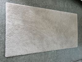 Teppich beige 152x80 cm