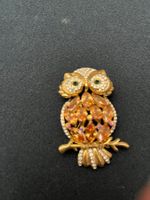 Brosche mit Swarovski-Steinen, ungetragen.