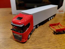 Herpa DAF XG+ rot mit Schiebeplanenauflieger in grau 1:87