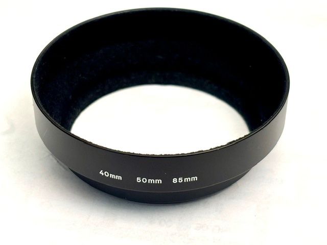 Konica Obiettivi: Konica Hexanon AR 85mm F1.8 / 1.8 EE-Version + Insekt? – Usato da Seewis Dorf venduto da Plebejus 1