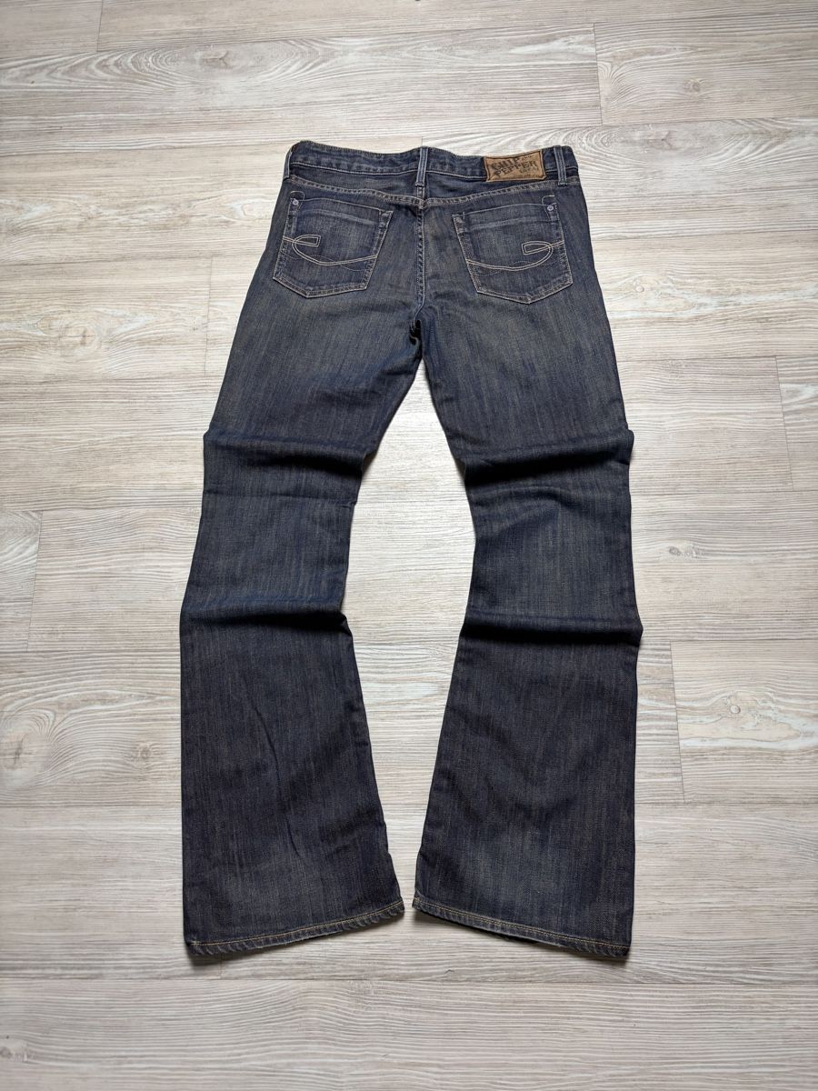 Jeans: Y2K Chip Pepper Bootcut Jeans W33/L32 – Nuovo (secondo la descrizione) da Safnern venduto da MaisonLouis