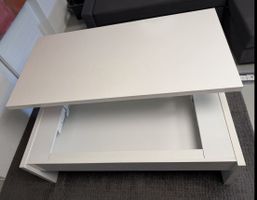 White lift-top coffee table, IKEA 