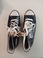 Converse violettes étoiles