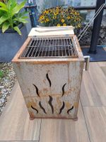 Feuerkorb und Grill CUBE rostig mit Schneidbrett und Zange