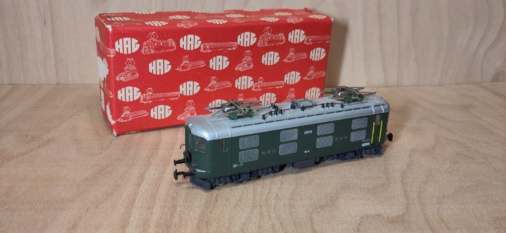 HAG 088 HO. locomotive CFF Re 4/4, 75 ans du SEV, avec boite