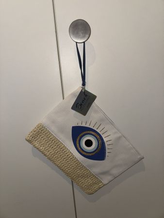 Pochette Beach Accessories motif oeil neuf beige bleu