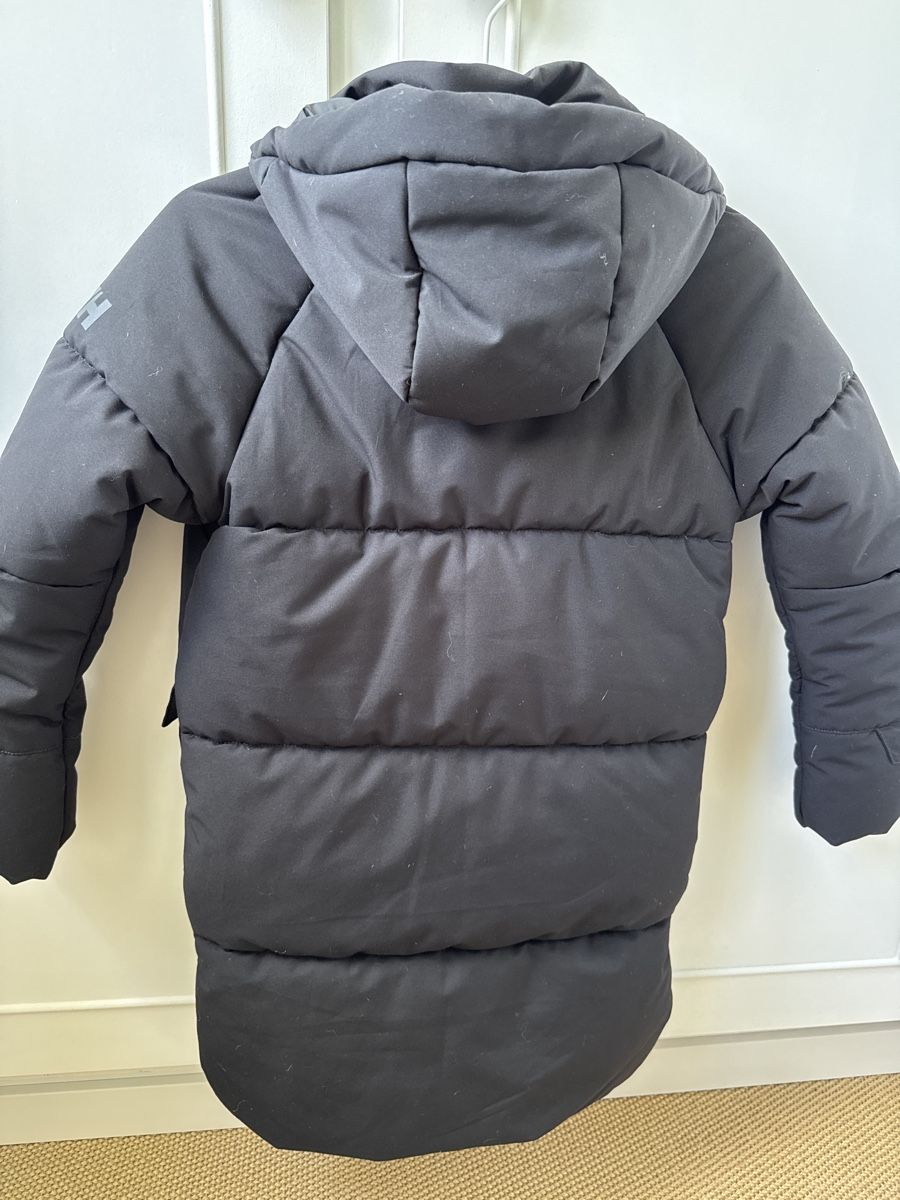 Helly Hansen Cappotti: Doudoune Helly Hansen noire, taille 128, comme neuve! – Usato da Puidoux venduto da serendipite 3