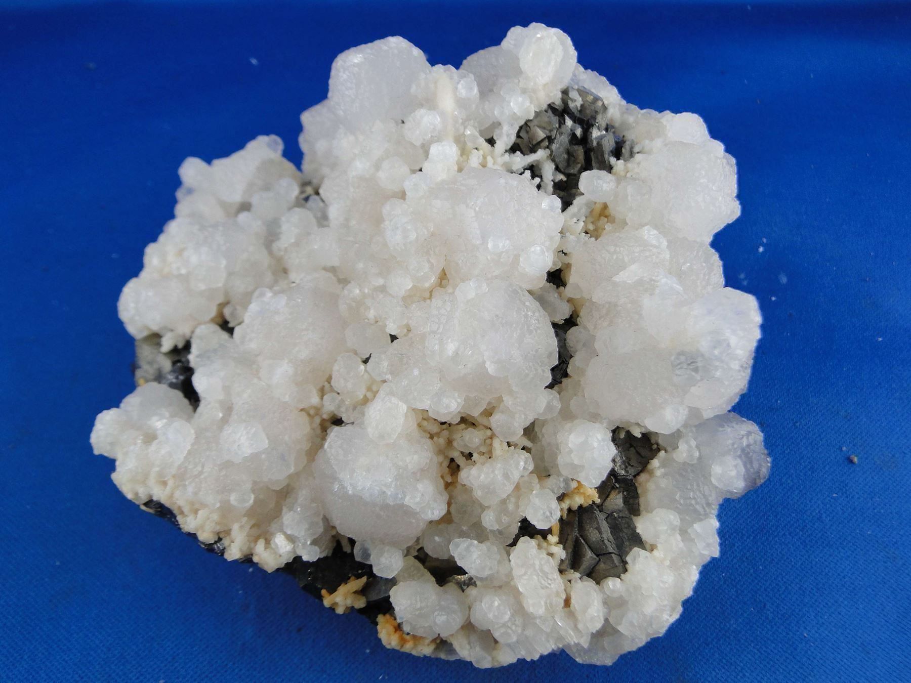 Minerali & Pietre curative: Arsenopyrit mit Calcit (UV-Pink) – Usato da Schinznach Bad venduto da Demerald 1