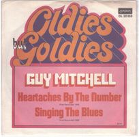 Guy Mitchell  --  Heartaches by the numberSingle7