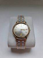 Universal Genève Quartz - Montre Suisse Bicolore Élégante