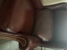 Fauteuil club cuir bordeaux vintage - Confort assuré!