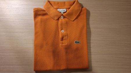 Polo Lacoste 12 ans comme neuf