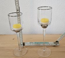 Zwei filigrane Teelichter mit Silberrand