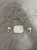 Apple AirPods Pro used with charging case and cable