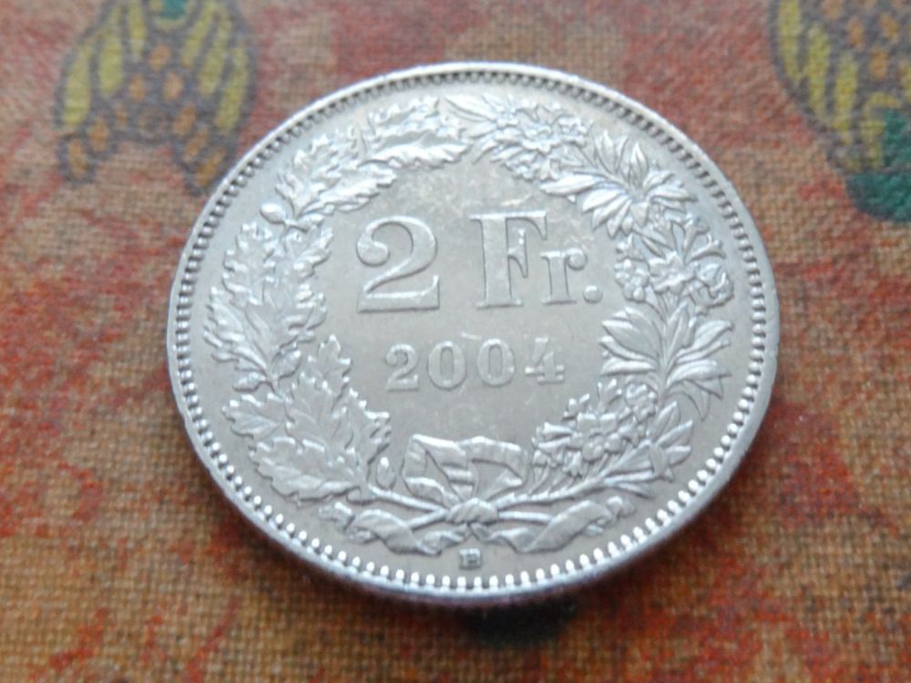 Tutti le monete: 2 Fr. 2004 – Usato da Romanel-sur-Lausanne venduto da Swift13
