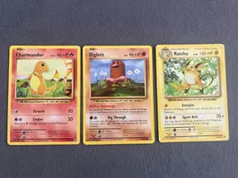 Pokémon XY Evolutions Lot 3x – Raichu, Glumanda, Diglett