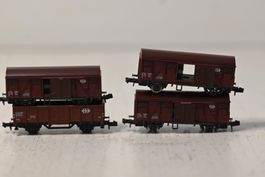 Güterwagen 3x Rivarossi , 1 x Trix Spur N  2 achsen fehlen