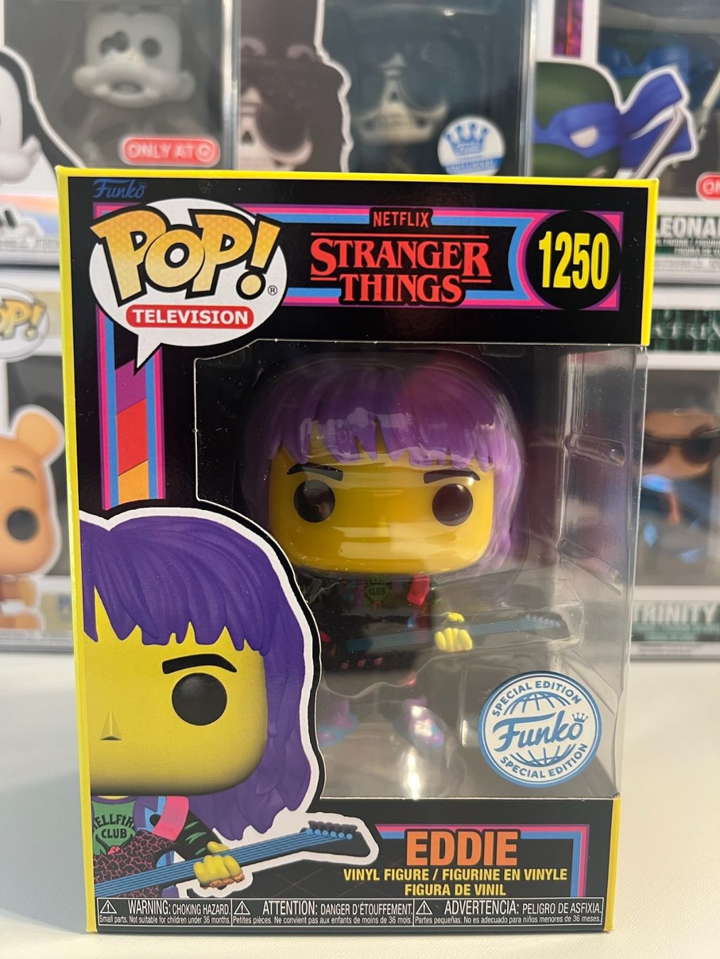 Funko Statuette: Funko POP! Stranger Things Blacklight Eddie with Guitar Lim. – Nuovo e nell'imballaggio originale da Le Mouret venduto da perfectbijou