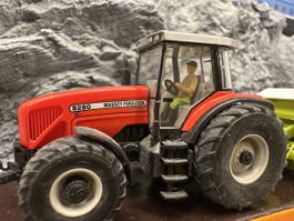 Wiking Massey Ferguson Traktor mit Claas Rundballenpresse